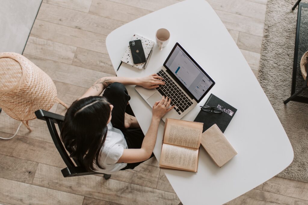 Woman home working on her laptop